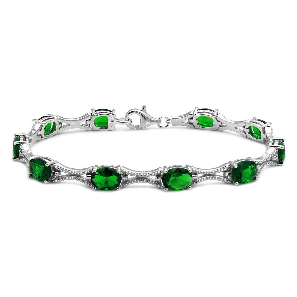 Rhodium Plated 925 Sterling Silver Green Oval CZ Tennis Bracelet - BGB00290GRN